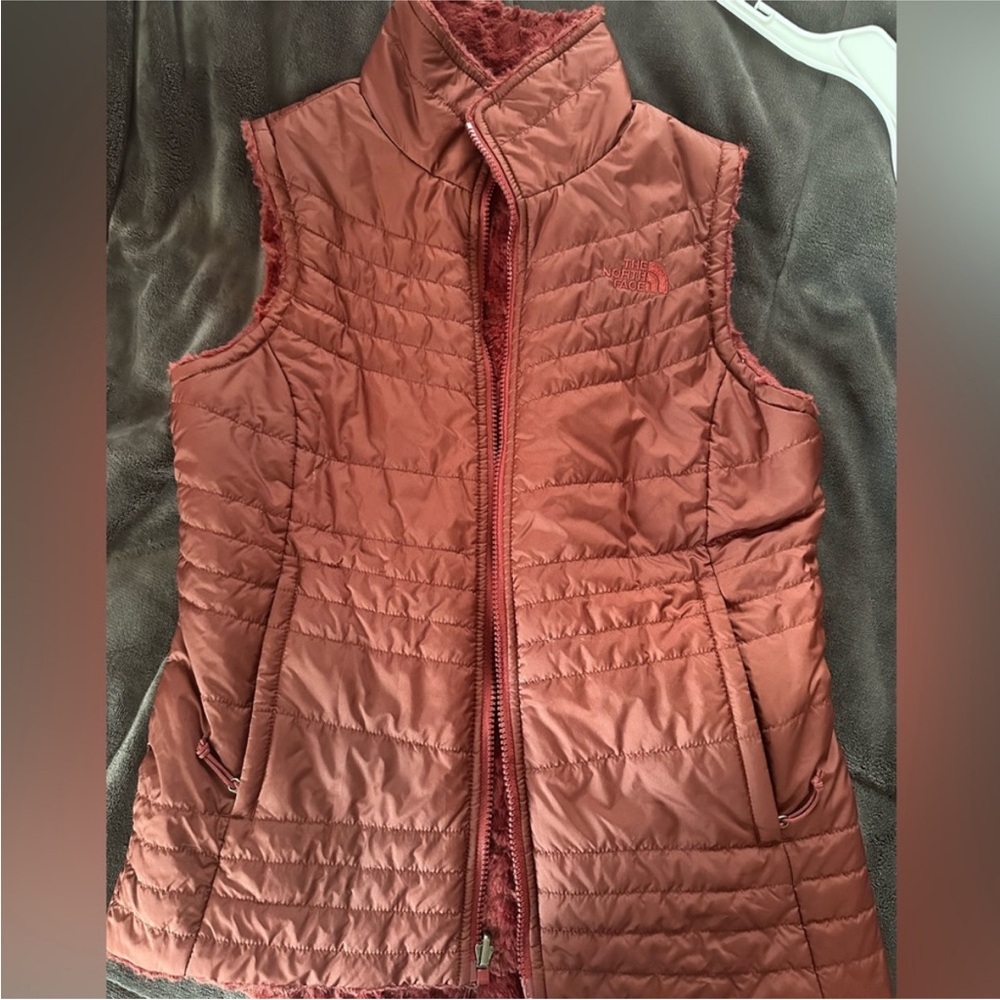 The North Face Reversible Women's Quilted Vest in Brown Rust Red Burgundy fuzzy